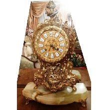 RELOJ Y FLOREROS DORADOS MEDIDAS 34 X 48