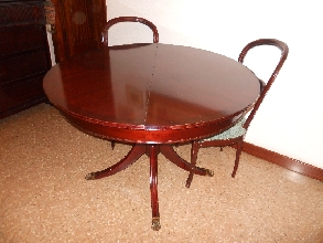 conjunto mesa redonda extensible con 6 sillas