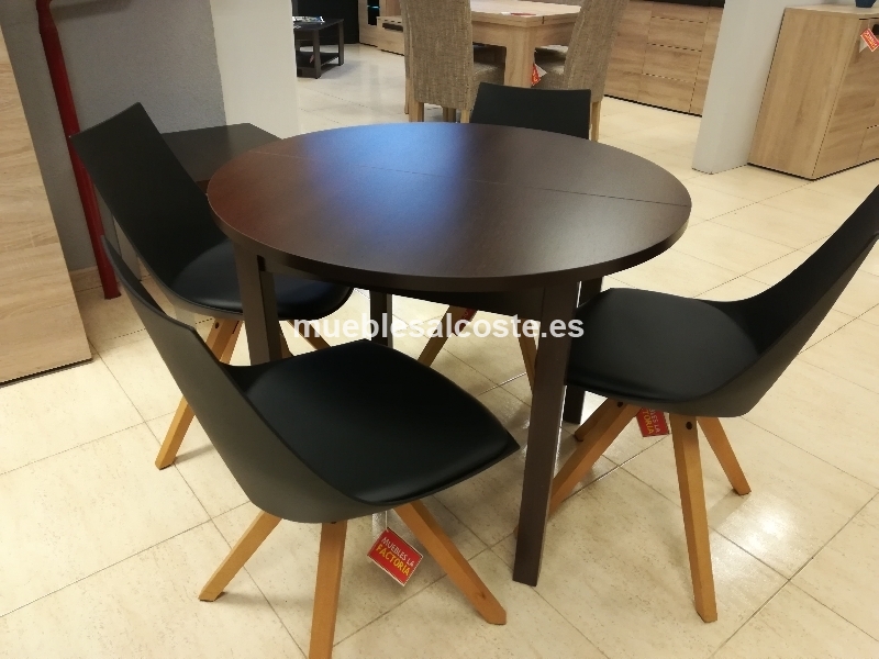 Conjunto de mesa redonda y 4 sillas negras pata nrdica. 